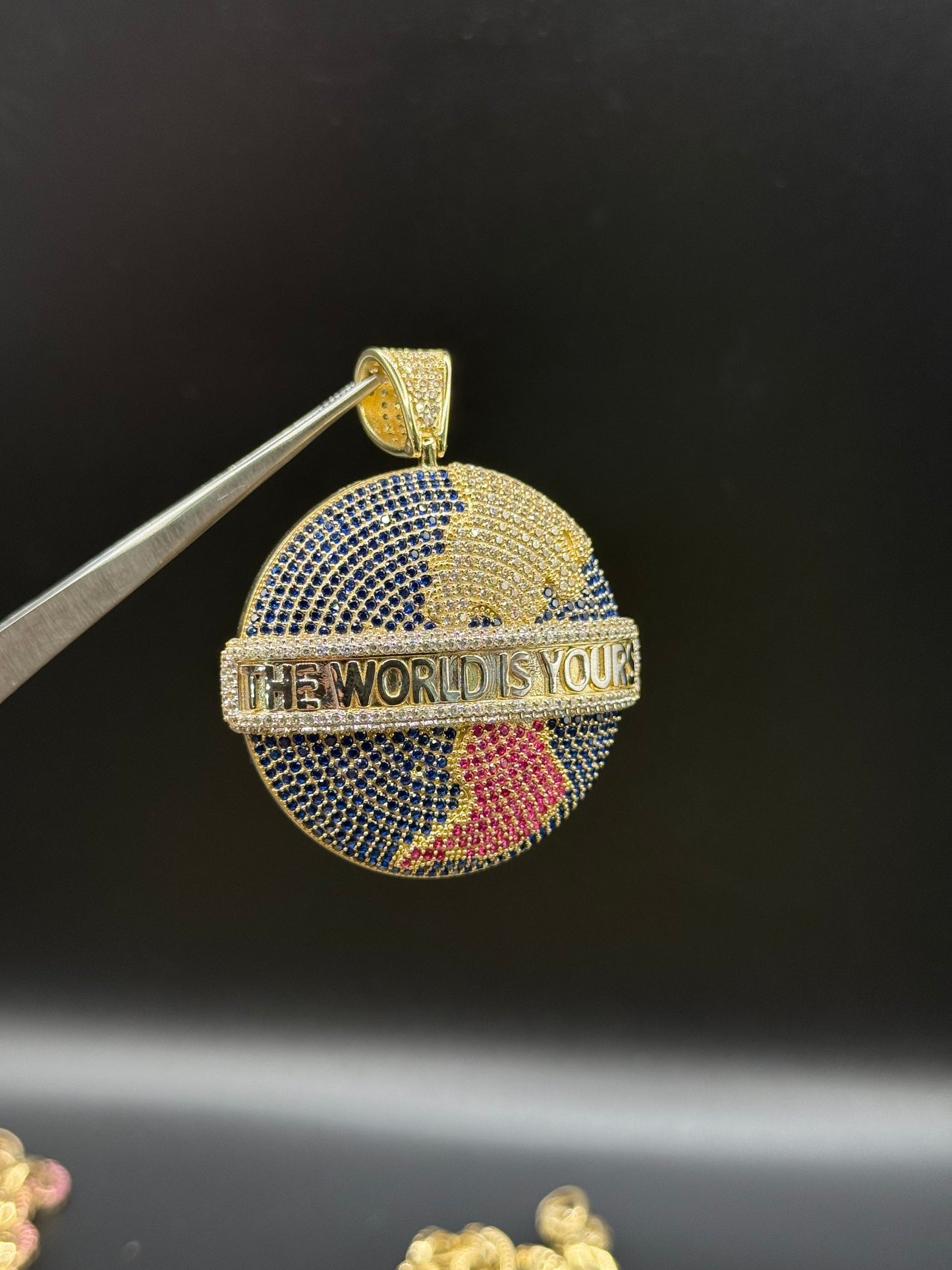 THE WORLD IS YOURS PENDANT